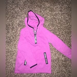 Justice quarter zip softball pullover. Girls size 6. Purple with black detail.